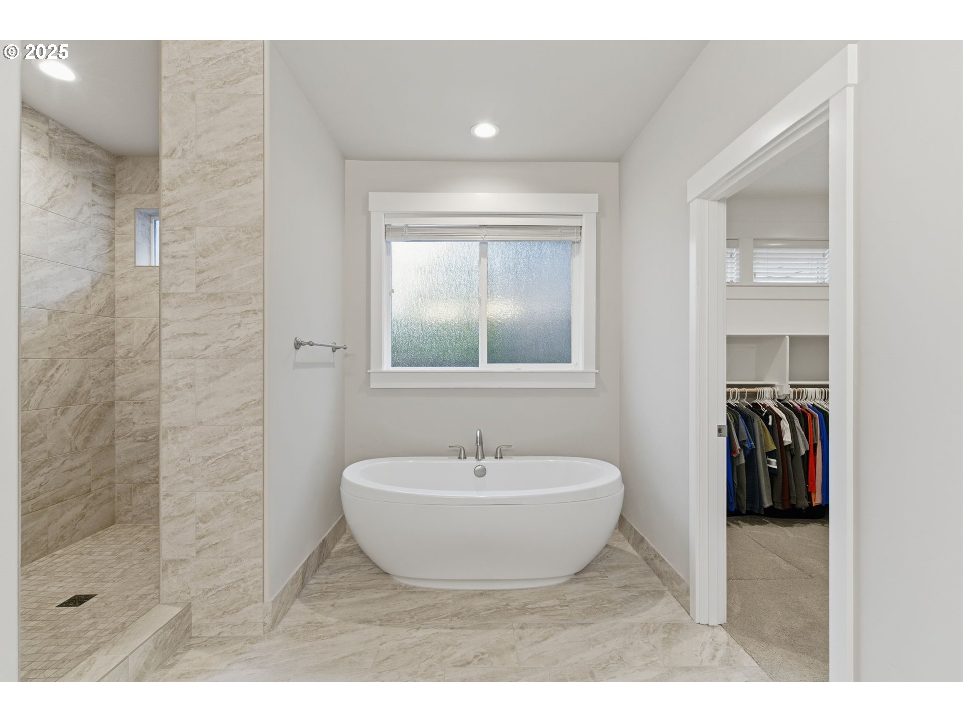3228 Northwest Hood Court Camas, WA 98607 - Photo 14 of 28 a spacious bathroom with a sink and a mirror
