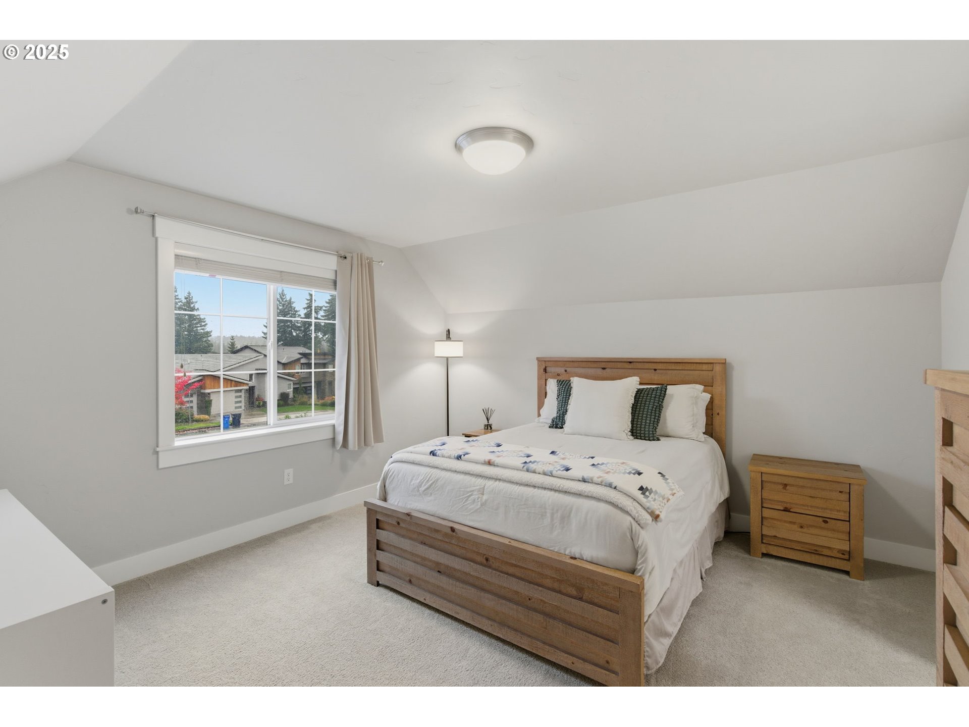 3228 Northwest Hood Court Camas, WA 98607 - Photo 21 of 28 a bedroom with a bed and a window