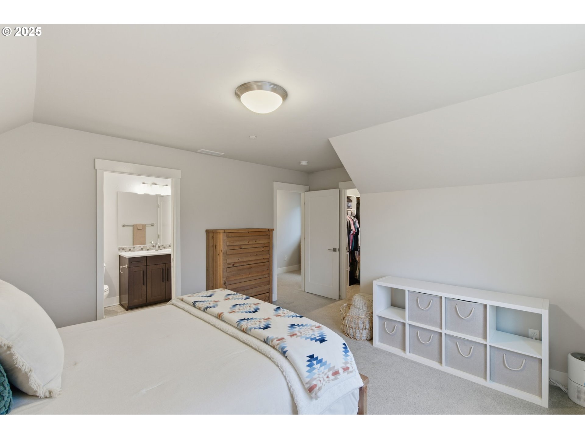 3228 Northwest Hood Court Camas, WA 98607 - Photo 22 of 28 a bedroom with a bed and a dresser