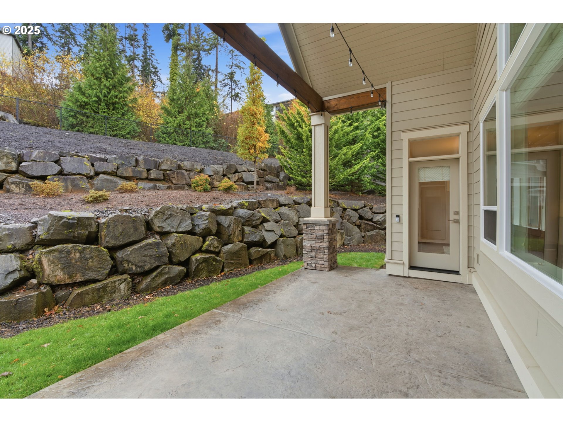 3228 Northwest Hood Court Camas, WA 98607 - Photo 25 of 28 a view of a chair and table in backyard of the house