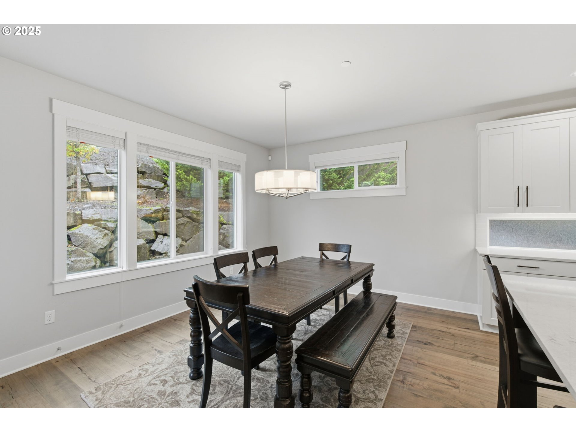 3228 Northwest Hood Court Camas, WA 98607 - Photo 7 of 28 a view of a dining room with furniture window and wooden floor