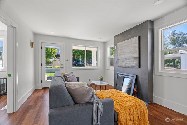 a bedroom with a bed and a couch