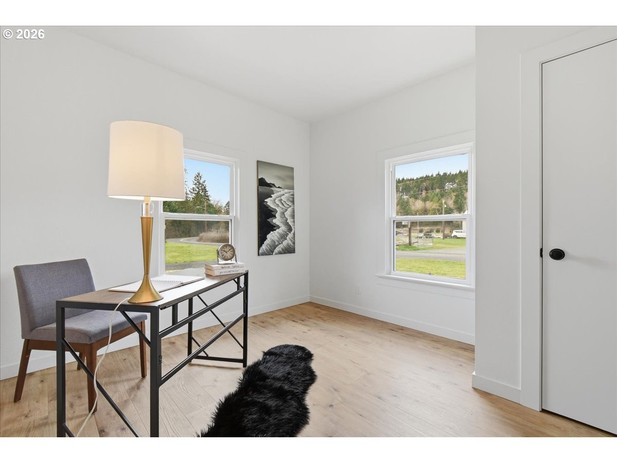 1313 Hining Road Winlock, WA 98596 - Photo 11 of 46 a view of a livingroom with furniture and a window