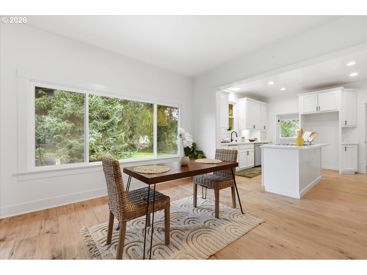 1313 Hining Road Winlock, WA 98596 - Photo 12 of 46 a dining room with furniture and wooden floor