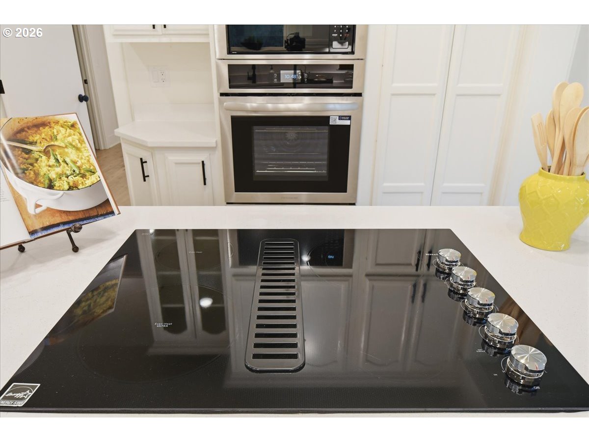 1313 Hining Road Winlock, WA 98596 - Photo 18 of 46 a kitchen with a stove and a microwave