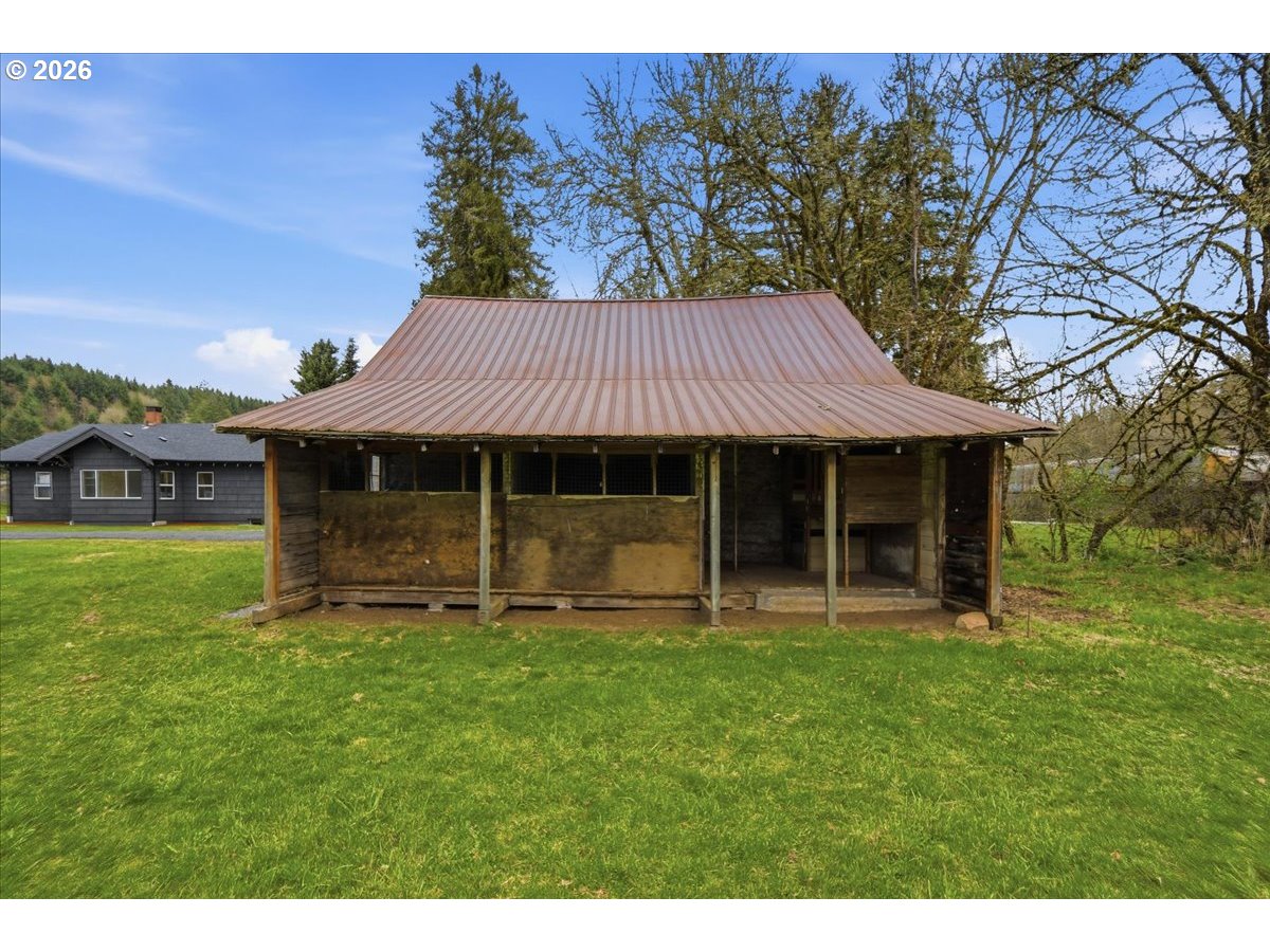 1313 Hining Road Winlock, WA 98596 - Photo 36 of 46 a view of a house with a yard