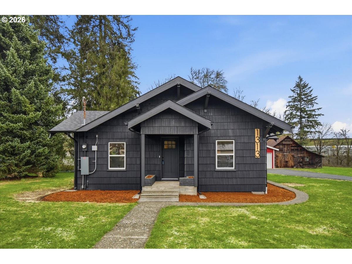 1313 Hining Road Winlock, WA 98596 - Photo 46 of 46 a front view of a house with a yard