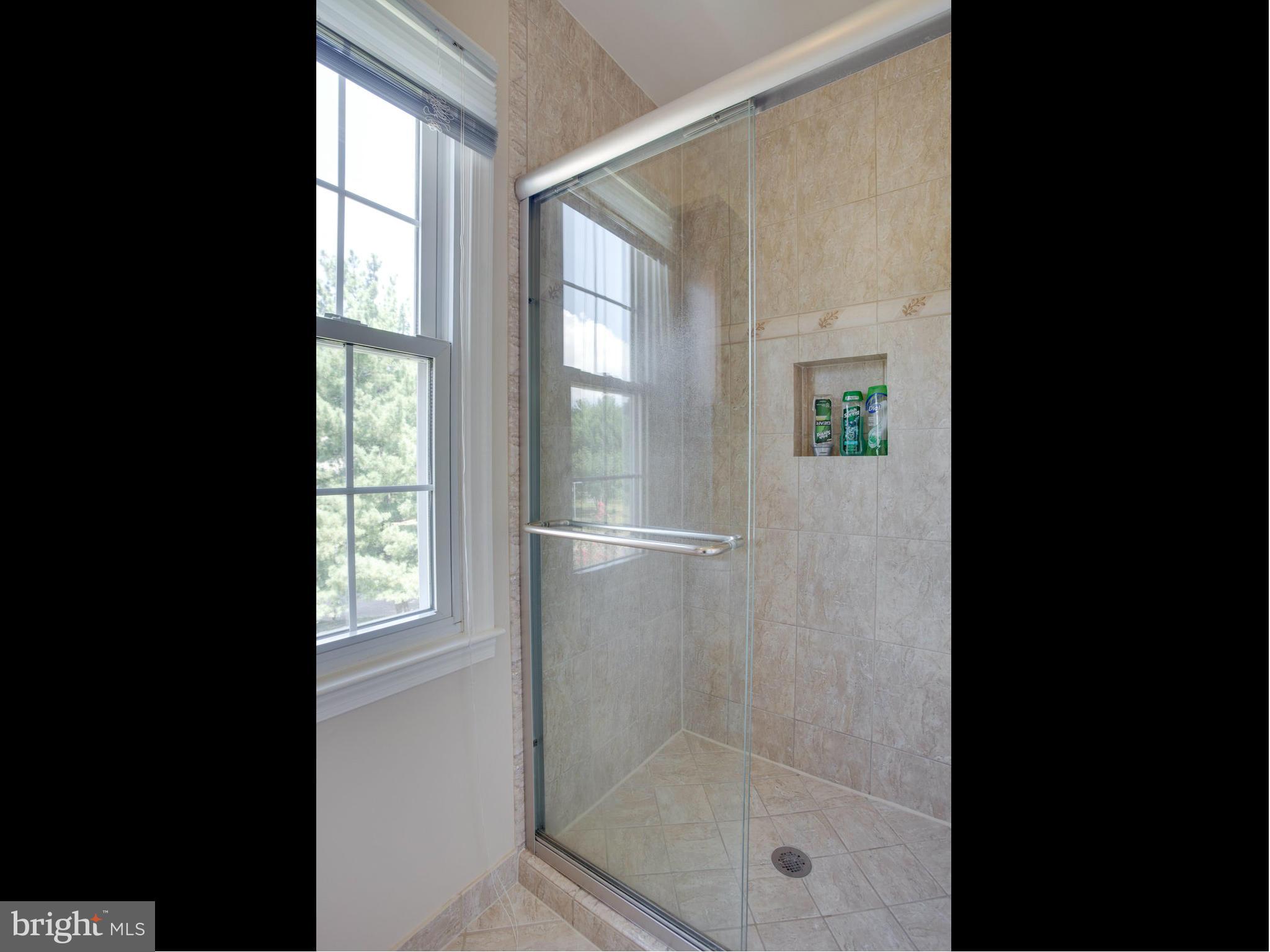 120 Environs Road Sterling, VA 20165 - Photo 16 of 30 Walk-in Shower with Large Tile Detail
