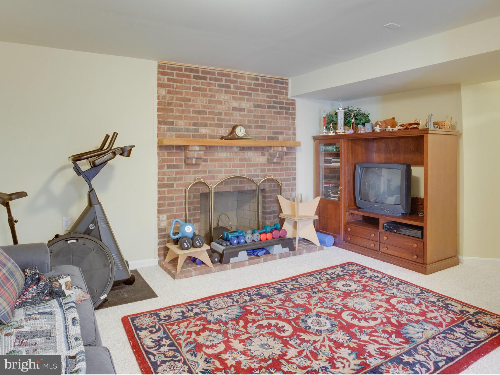 120 Environs Road Sterling, VA 20165 - Photo 23 of 30 Brick Wood Burning Fireplace To Gather Around