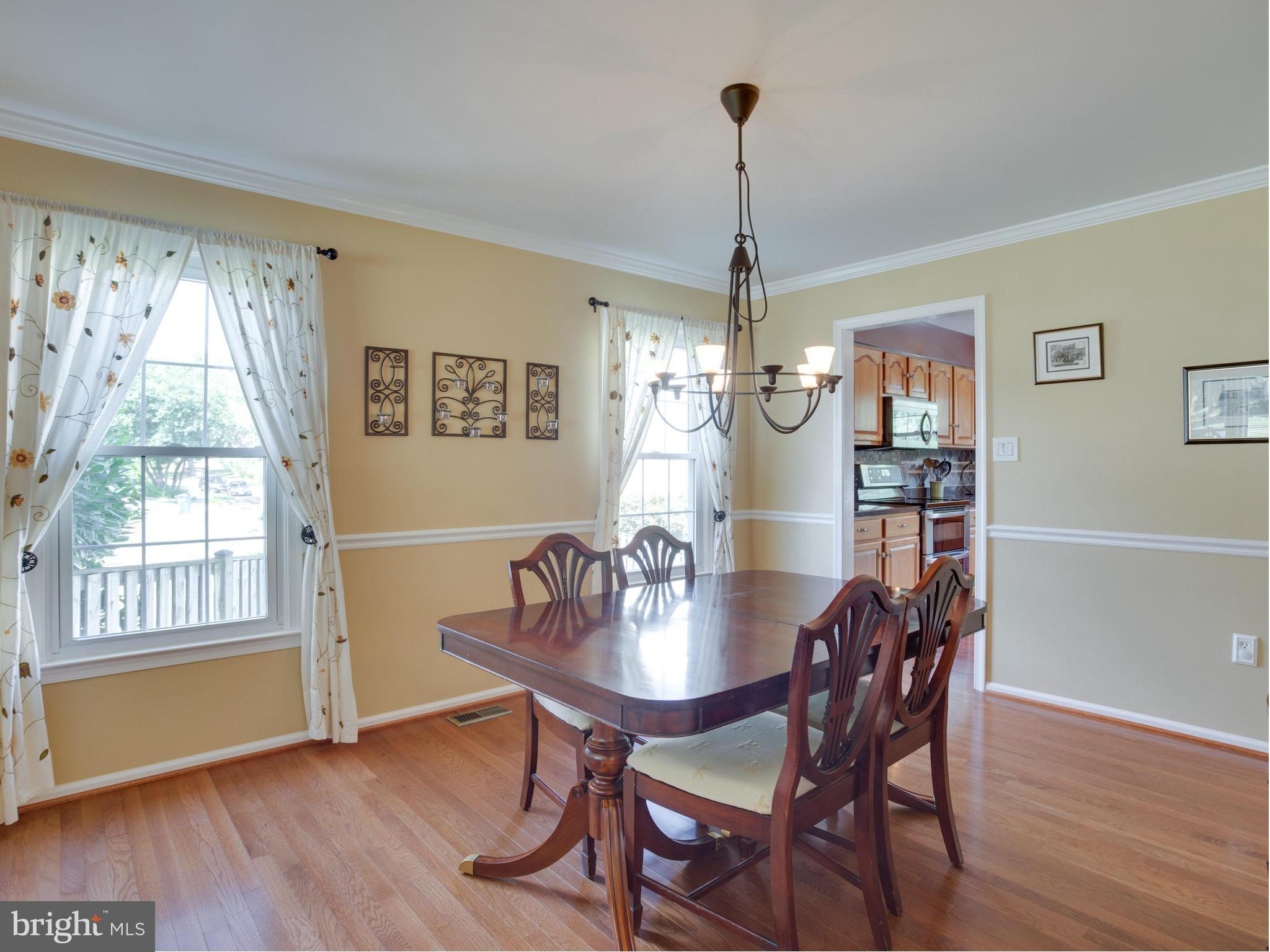 120 Environs Road Sterling, VA 20165 - Photo 8 of 30 Chair Rail and Crown Molding Give An Elegant Feel