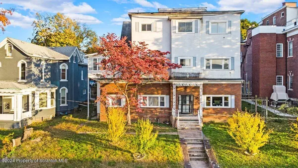 a front view of a building with street