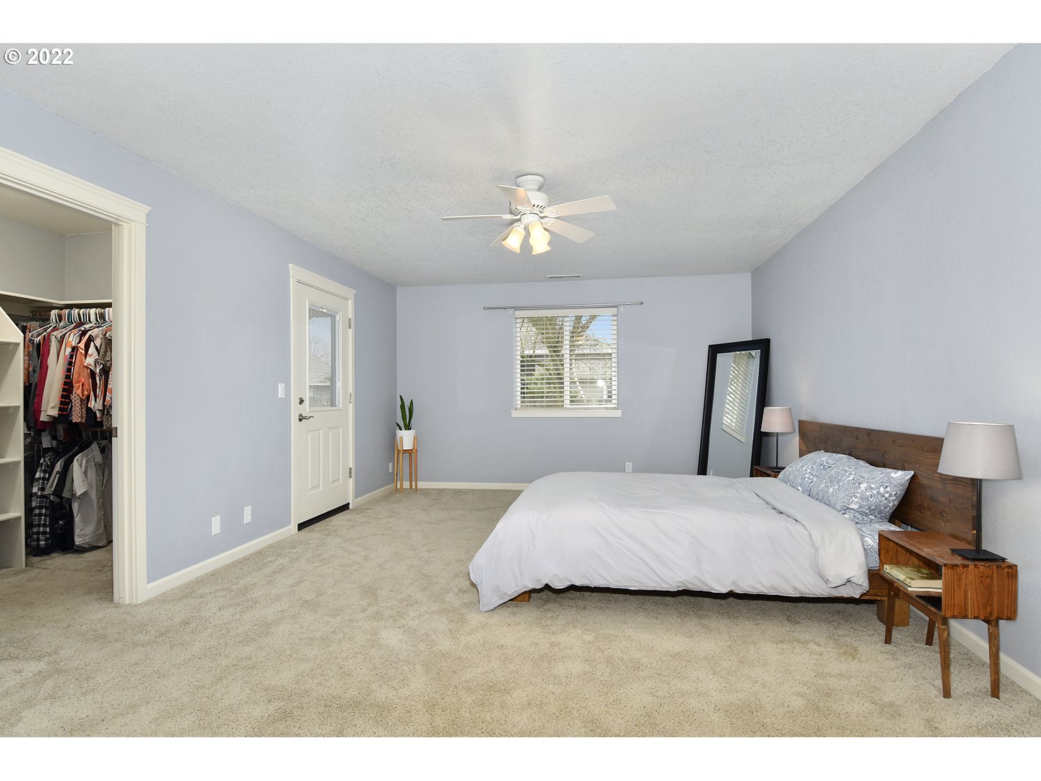 829 T Street Springfield, OR 97477 - Photo 13 of 20 a bedroom with a bed and a chandelier