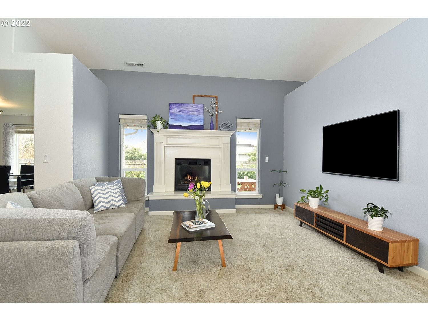 829 T Street Springfield, OR 97477 - Photo 4 of 20 a living room with furniture and a flat screen tv