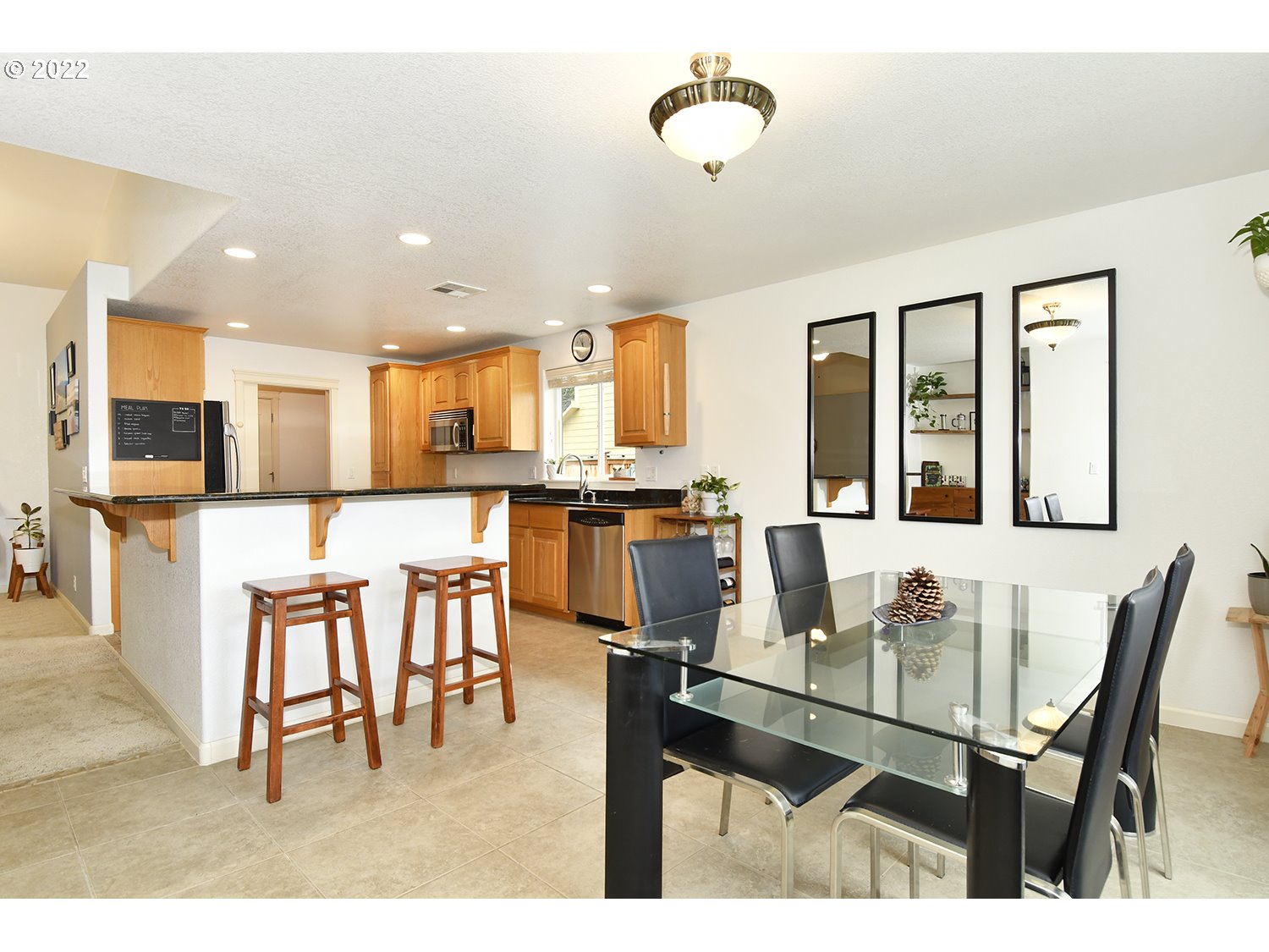 829 T Street Springfield, OR 97477 - Photo 8 of 20 a living room with stainless steel appliances kitchen island granite countertop furniture and a kitchen view