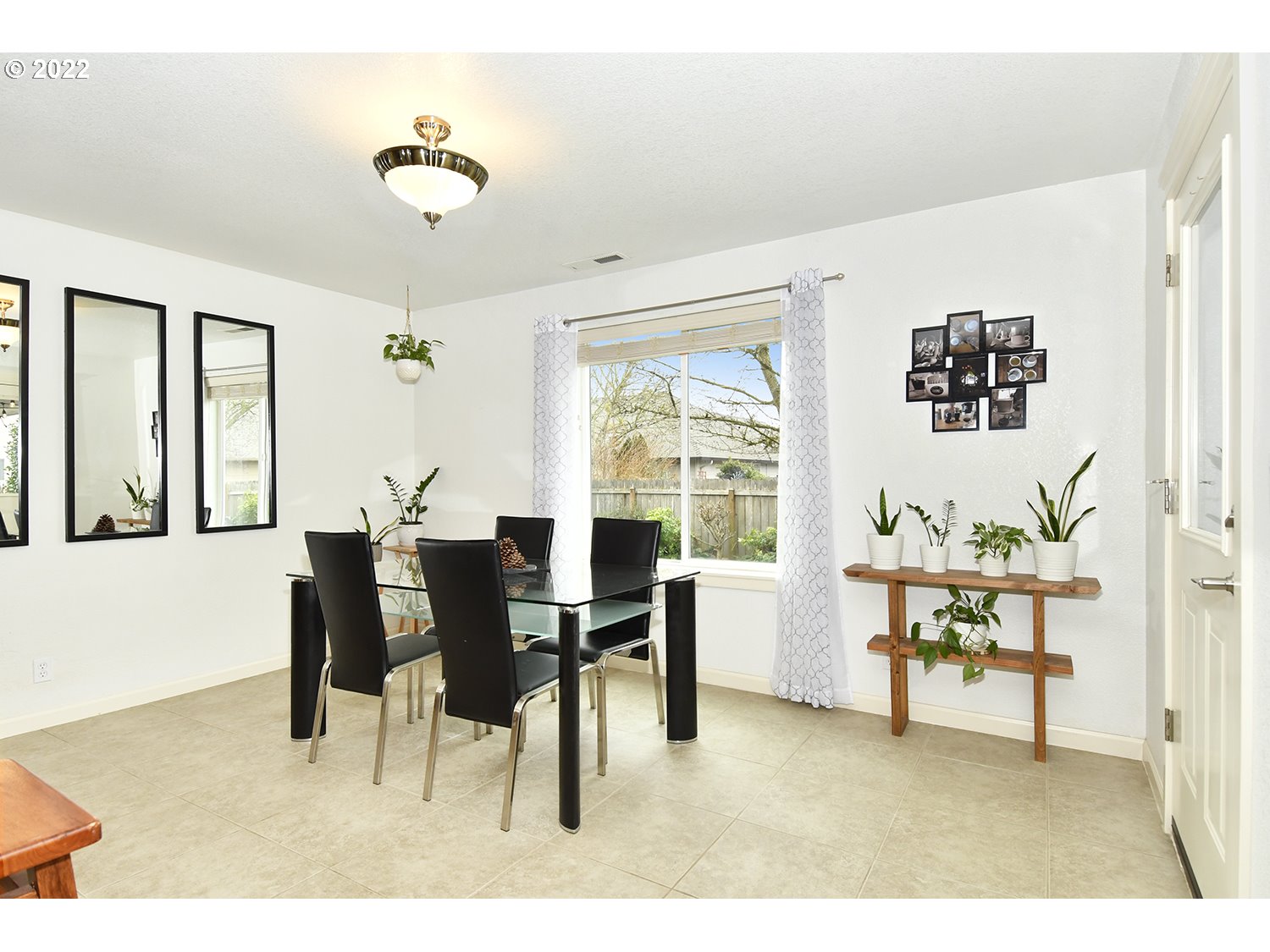 829 T Street Springfield, OR 97477 - Photo 9 of 20 a dining room with furniture and window