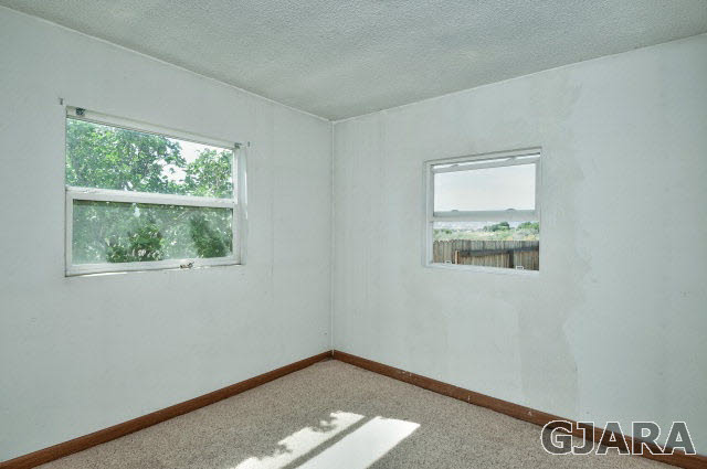 1190-18 18 1/2 Road Fruita, CO 81521 - Photo 19 of 35 a view of an empty room with a window