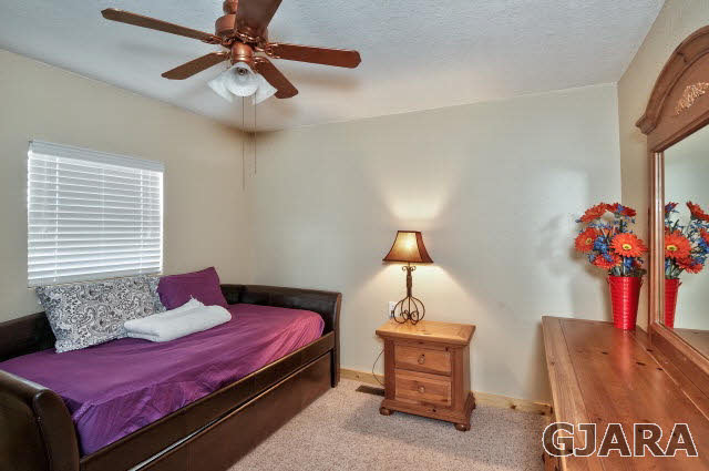 1190-18 18 1/2 Road Fruita, CO 81521 - Photo 20 of 35 a bedroom with furniture and a window