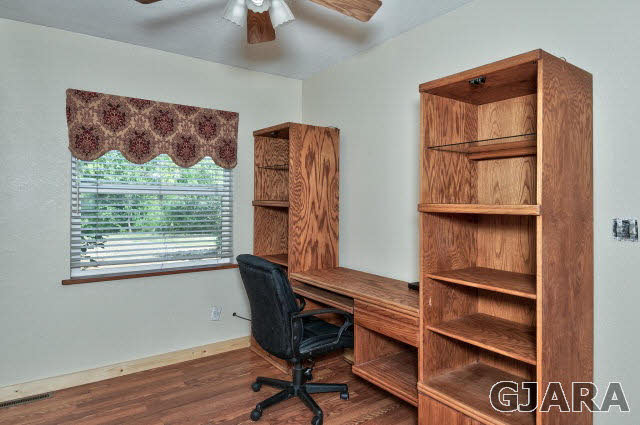 1190-18 18 1/2 Road Fruita, CO 81521 - Photo 8 of 35 a view of room with window and wooden floor