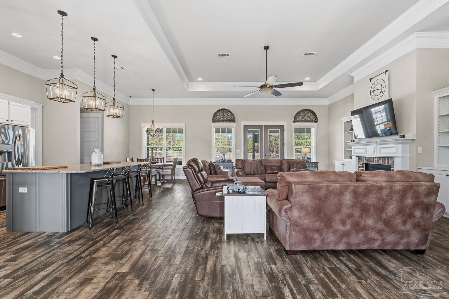 3550 Molino Road Molino, FL 32577 - Photo 13 of 68 a living room with fireplace furniture and a wooden floor