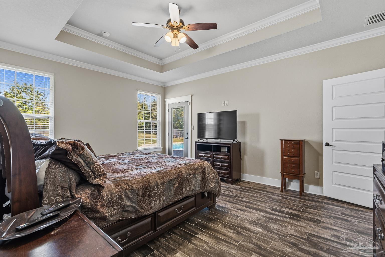 3550 Molino Road Molino, FL 32577 - Photo 28 of 68 a bedroom with a bed and a television