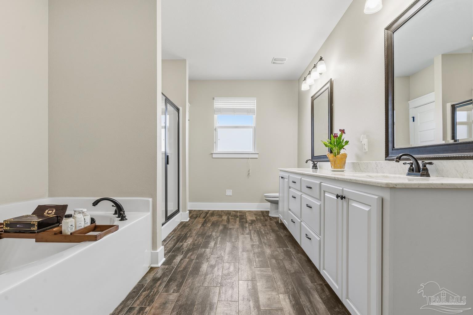 3550 Molino Road Molino, FL 32577 - Photo 29 of 68 a bathroom with a sink and a mirror