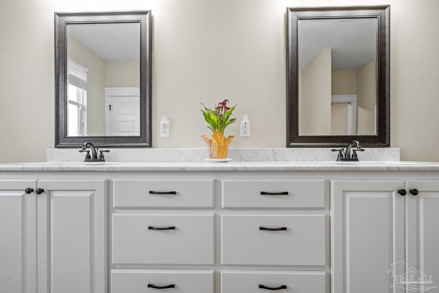 3550 Molino Road Molino, FL 32577 - Photo 31 of 68 a bathroom with vanity sink and mirror