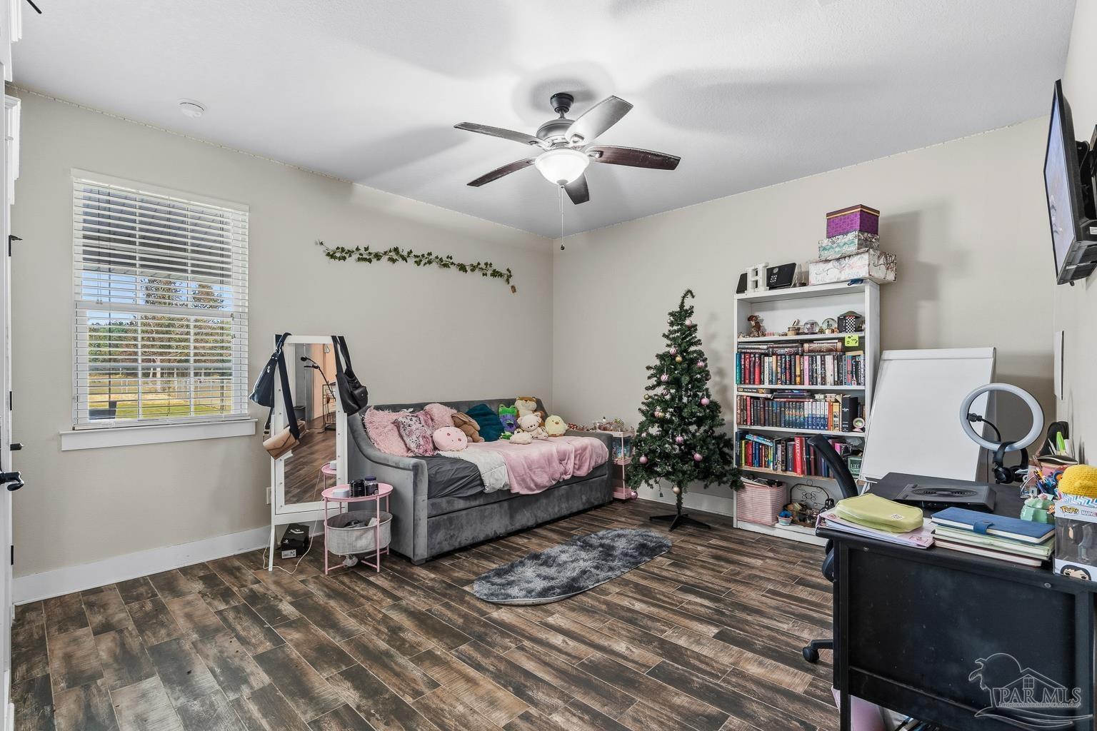 3550 Molino Road Molino, FL 32577 - Photo 42 of 68 a bedroom with furniture and a window