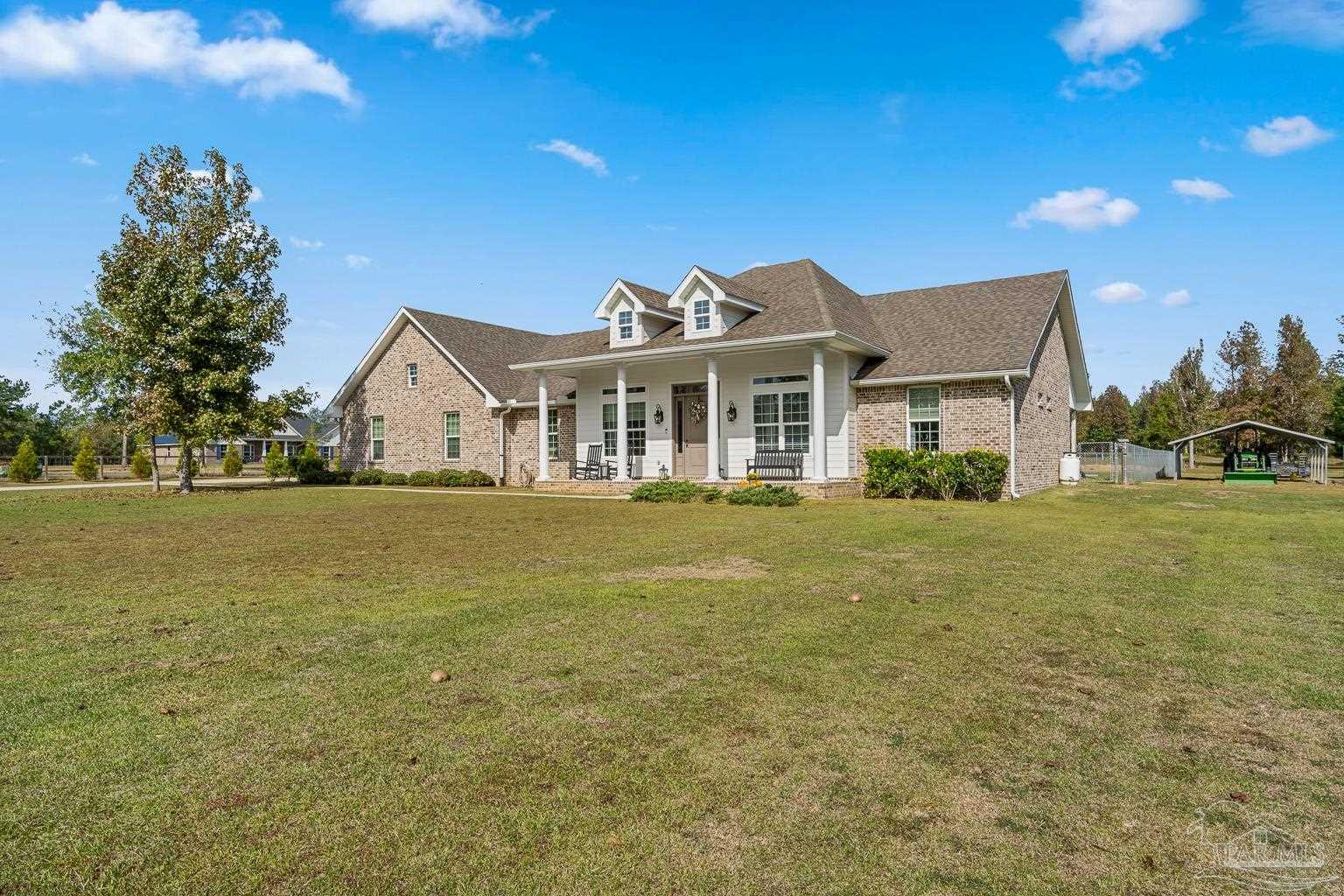 3550 Molino Road Molino, FL 32577 - Photo 5 of 68 a view of house with garden
