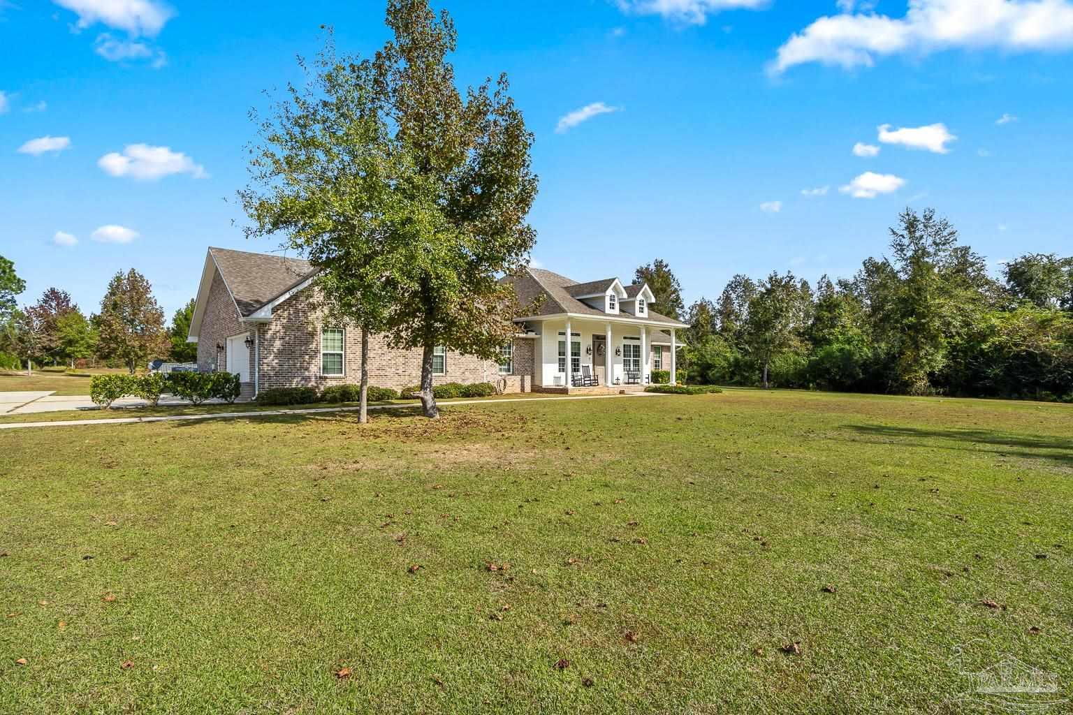 3550 Molino Road Molino, FL 32577 - Photo 6 of 68 a view of an outdoor space and swimming pool