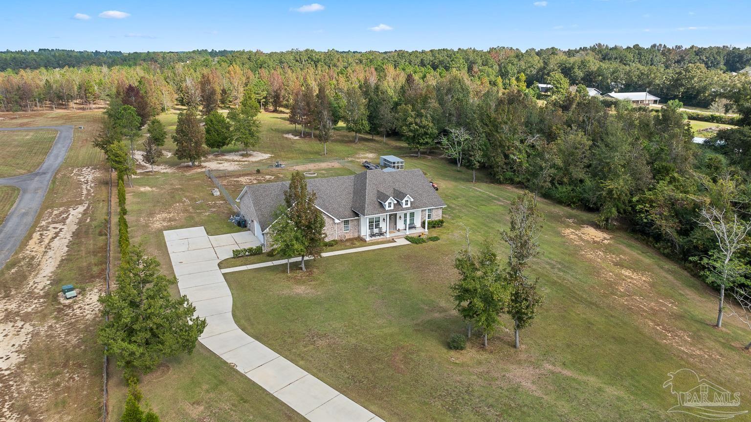3550 Molino Road Molino, FL 32577 - Photo 66 of 68 an aerial view of residential houses with outdoor space and river