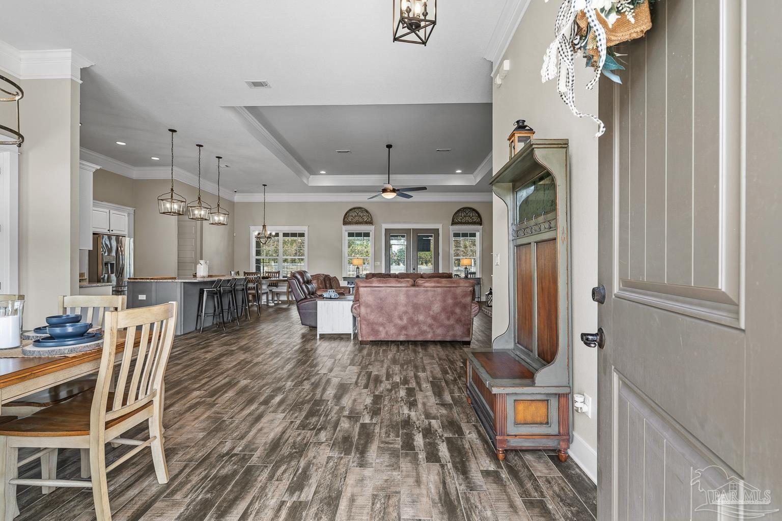 3550 Molino Road Molino, FL 32577 - Photo 10 of 68 a living room with furniture and a chandelier