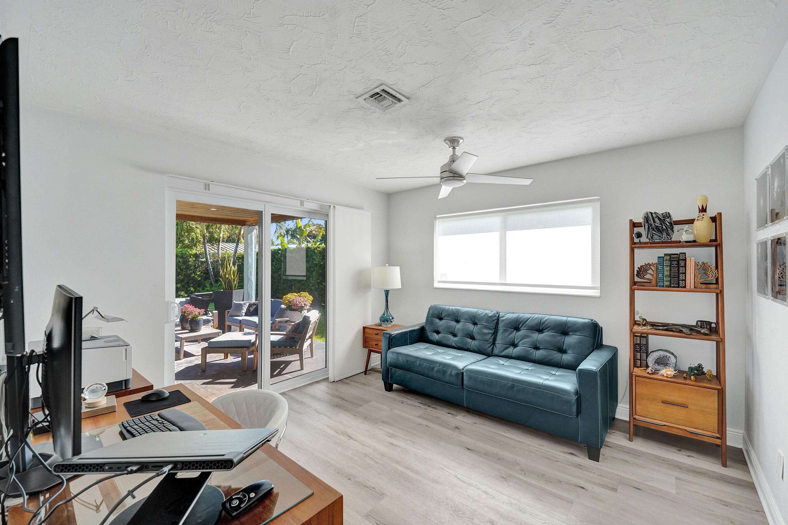 381 Southeast 3rd Street Pompano Beach, FL 33060 - Photo 26 of 41 a living room with furniture and a window