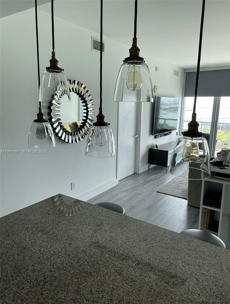 888 Biscayne Boulevard, Unit 1810 Miami, FL 33132 - Photo 20 of 28 a view of a living room and window