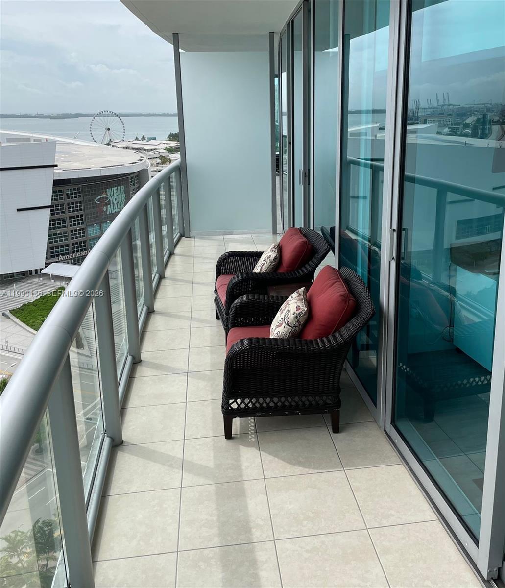 888 Biscayne Boulevard, Unit 1810 Miami, FL 33132 - Photo 24 of 28 a building outdoor space with seating