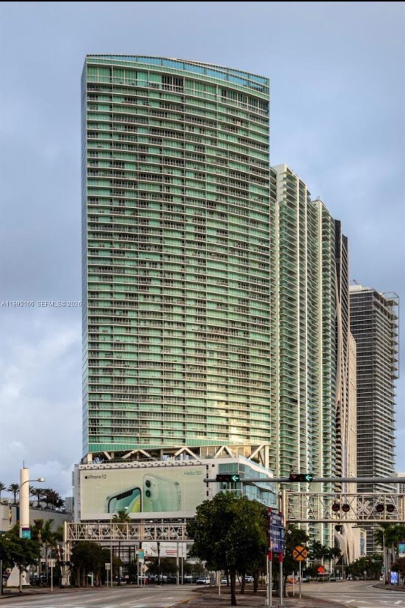 888 Biscayne Boulevard, Unit 1810 Miami, FL 33132 - Photo 3 of 28 a front view of a building with glass windows