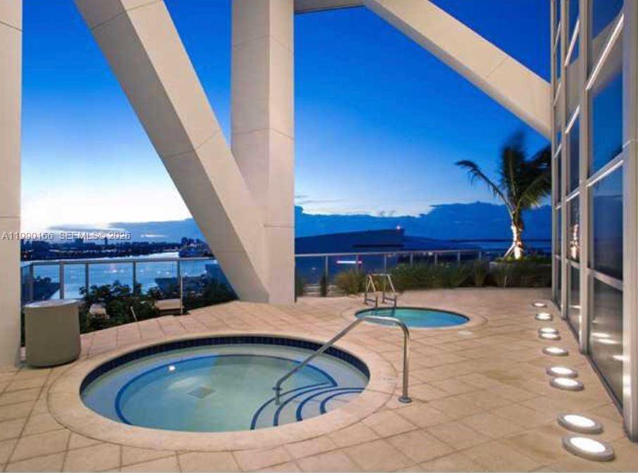888 Biscayne Boulevard, Unit 1810 Miami, FL 33132 - Photo 4 of 28 a view of balcony with outdoor seating