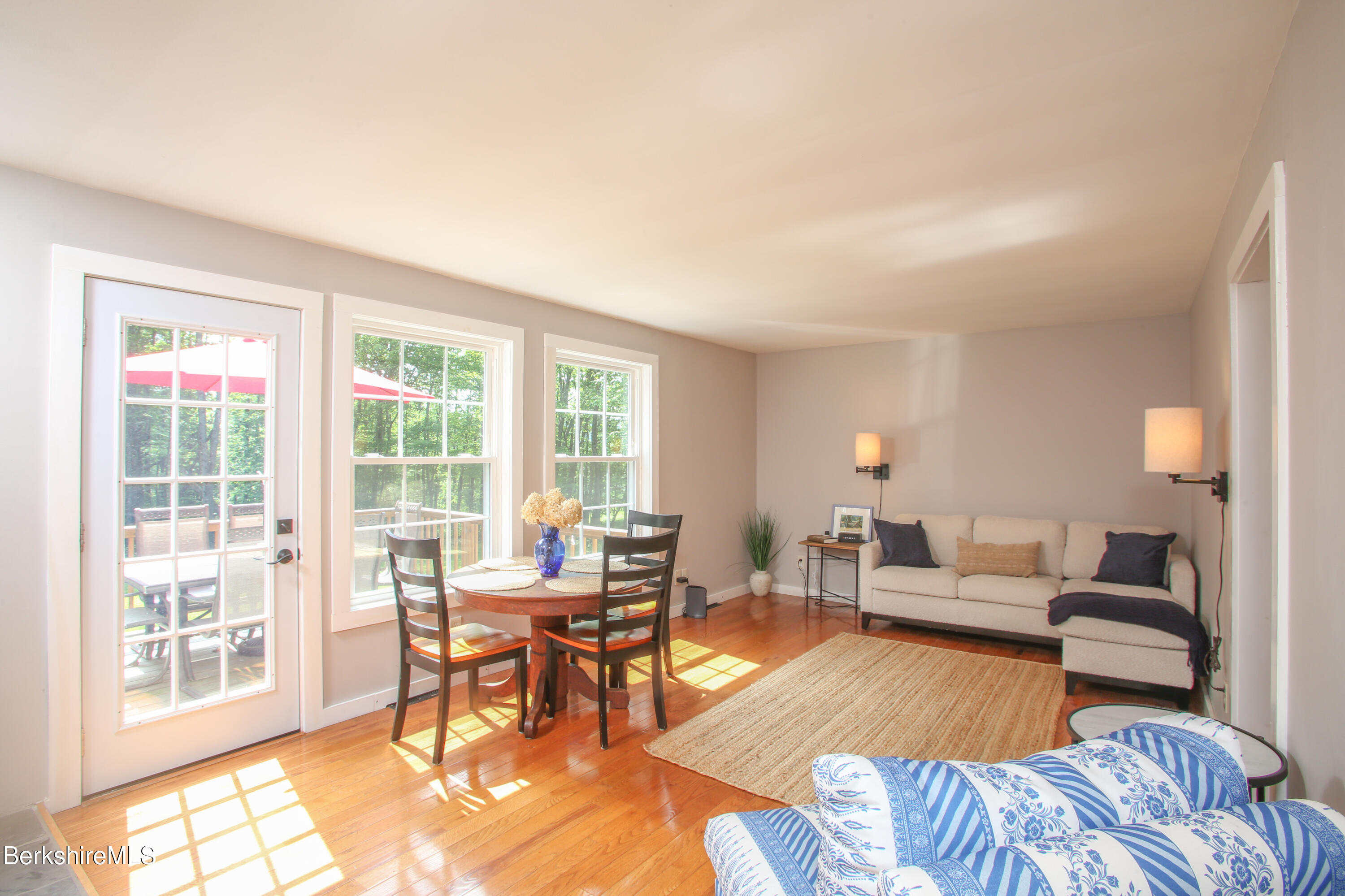 127 County Road Rowe, MA 01367 - Photo 7 of 29 a living room with furniture and a large window