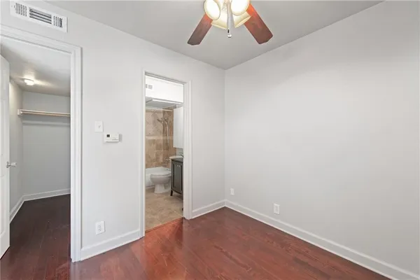 a view of an empty walk in closet