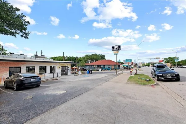 a view of a street with cars