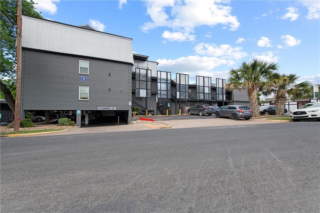 2020 South Congress Avenue, Unit 1216 Austin, TX 78704 - Photo 24 of 33 a car parked in front of a building