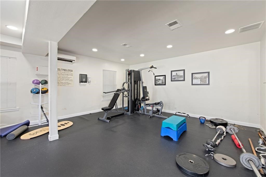 2020 South Congress Avenue, Unit 1216 Austin, TX 78704 - Photo 29 of 33 a view of a room with gym equipment