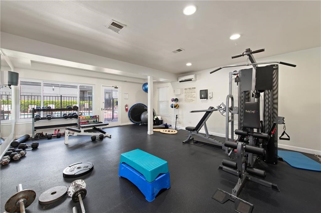 2020 South Congress Avenue, Unit 1216 Austin, TX 78704 - Photo 30 of 33 a view of a room with gym equipment