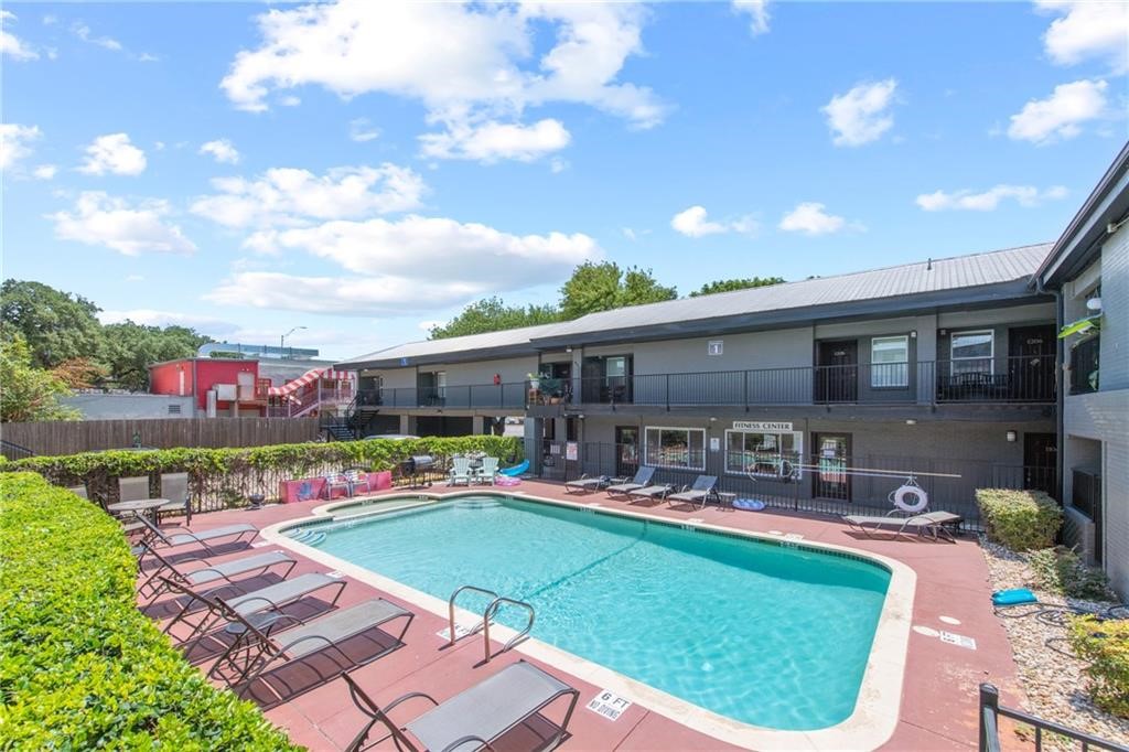 2020 South Congress Avenue, Unit 1216 Austin, TX 78704 - Photo 31 of 33 a front view of house with outdoor space swimming pool and outdoor seating