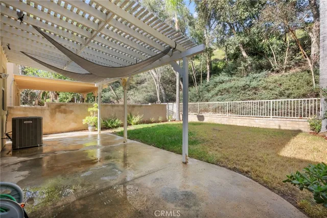 a view of a porch with a backyard