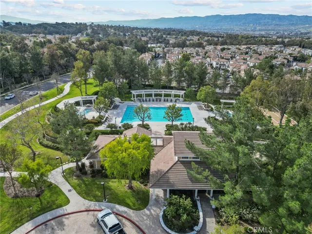 an aerial view of a house with a garden