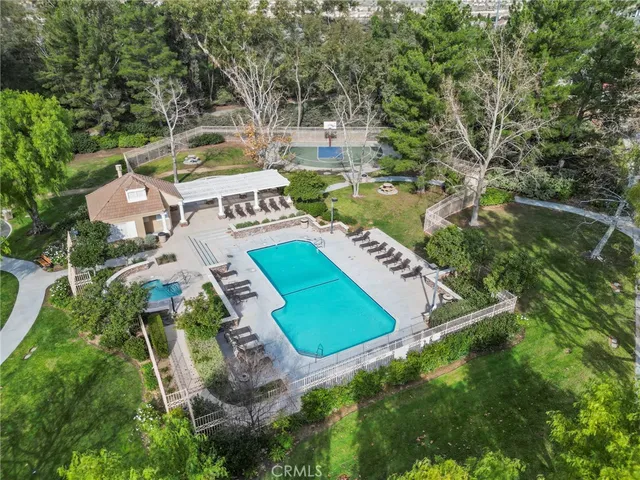 an aerial view of a house with outdoor space