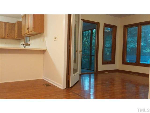 716 Stem Road Creedmoor, NC 27522 - Photo 4 of 25 Dining Area leading into Sunroom.
