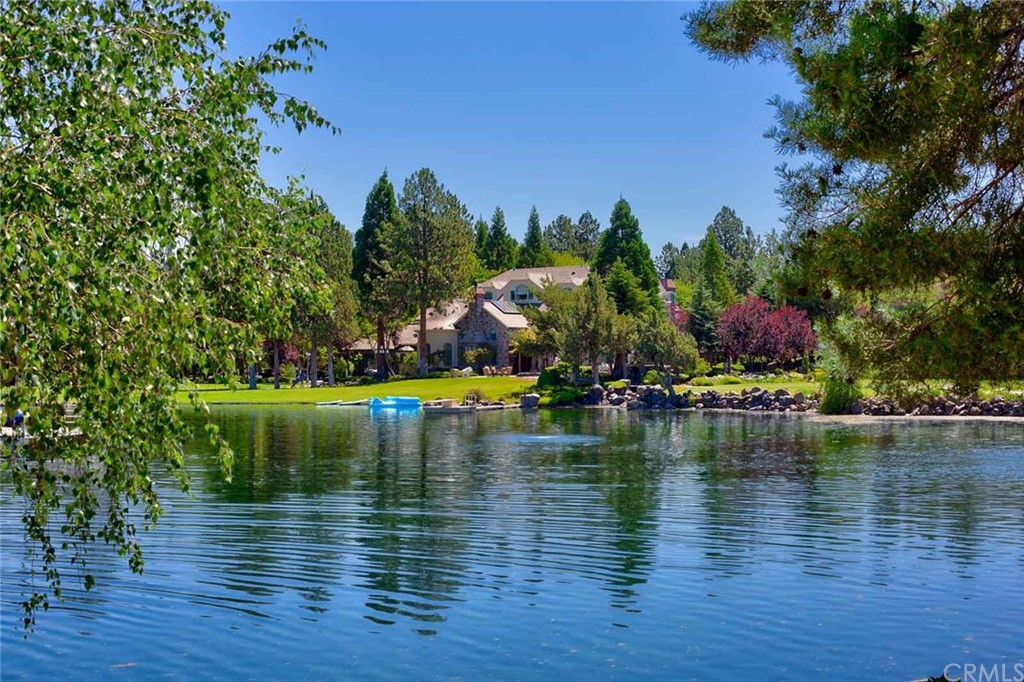 15733 Juniper Peak Road Weed, CA 96094 - Photo 3 of 74 a view of swimming pool with outdoor space and lake view