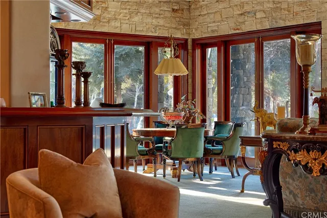 a view of a workspace with furniture