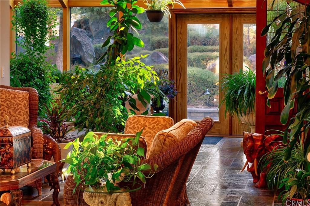 15733 Juniper Peak Road Weed, CA 96094 - Photo 35 of 74 a view of balcony with plants and outdoor seating